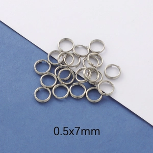 Close-up of 0.5x7mm silver stainless steel split rings for DIY jewelry making
