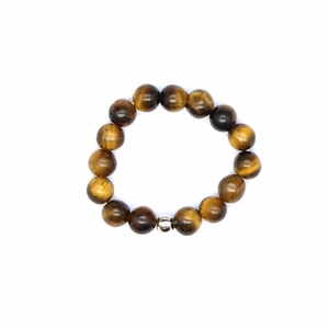 Detailed view of 4mm tiger eye stone elastic ring featuring polished brown beads