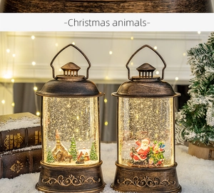 Close-up of vintage bronze Christmas lanterns with Santa Claus and a snowy scene inside