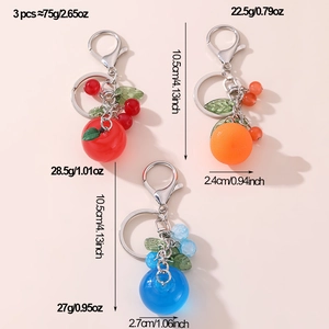 Detailed view of 3pcs fruit keychains with weight and size specifications for each