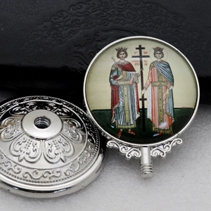 Detail of a metal Orthodox religious icon with silver base featuring Saint Constantine and Helen