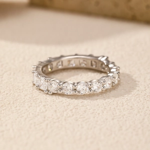 Elegant S925 sterling silver eternity ring with sparkling full round-cut clear crystals