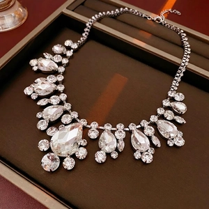 Luxury silver teardrop crystal geometric statement necklace for elegant evening wear