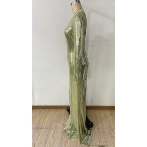 Detail showing high-density square sequins and floor-length hem of the evening gown
