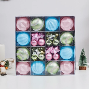 Pastel Christmas ornament set with macarons and stars in a 16-compartment display box