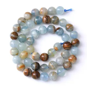 Natural blue calcite round beads for jewelry making with polished texture