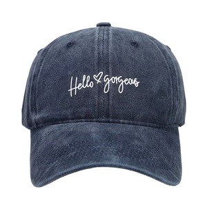 Classic navy washed denim baseball cap with white Hello Gorgeous embroidery and heart