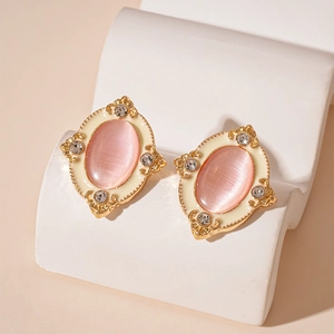 Vintage oval earrings with pink cat-eye stone and diamonds in French palace style