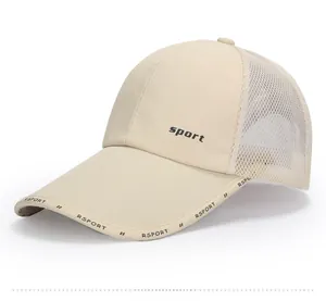 Detail view of beige breathable mesh baseball cap with elongated sunshade visor