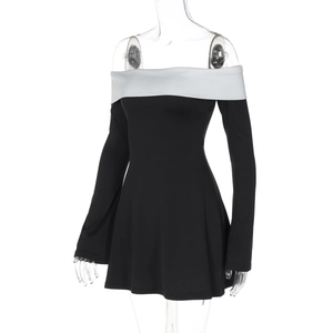 Détail d'une mini-robe élégante à épaules dénudées avec col à revers contrasté blanc