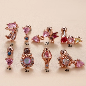 Eight assorted rose gold surgical steel ear studs featuring colorful crystals and opals