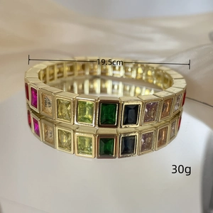 Macro detail of 19.5cm colorful geometric gemstone bracelet with gold-tone metal frame