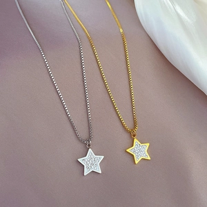 Minimalist titanium steel star pendants with cubic zirconia on gold and silver chains