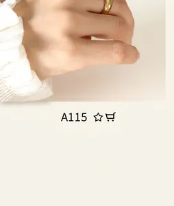 Close-up of a polished gold minimalist dome ring worn on the index finger for fashion