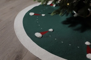 Jupe de sapin de Noël tricotée en vert foncé avec motifs de chapeaux de fête blancs