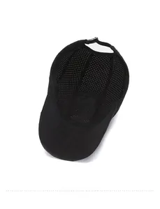 Internal view of a black breathable mesh summer cap showing the adjustable snapback