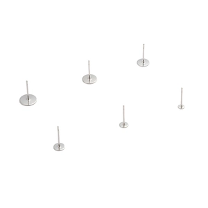 Detailed view of silver flat head stainless steel earring posts for DIY jewelry making