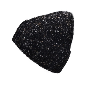 Detail of black knit beanie with colorful flecks and chunky ribbed texture for winter