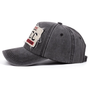 Distressed dark gray vintage baseball cap with CC embroidery and curved brim design