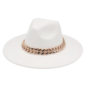 Detail of wide brim fedora hat featuring a chunky gold acrylic chain decorative band