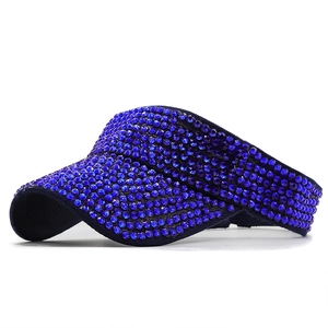 Royal blue sun visor for women featuring full rhinestone embellishment on a curved brim