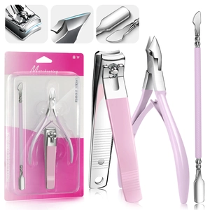 Macro details of professional stainless steel cuticle nippers and pusher for nail care
