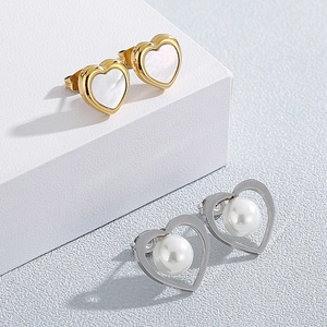 Elegant heart stud earrings in gold and silver finish with pearl and shell inlay detail