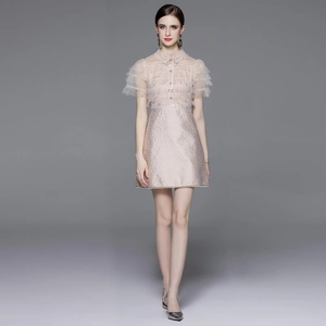 Champagne pink sequin lace dress with tiered ruffle sleeves and jacquard skirt full front view