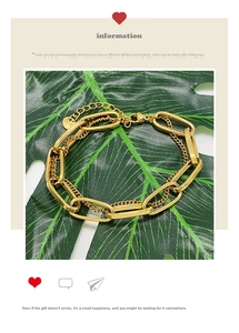 Detail of gold titanium steel double-layer chain bracelet with K18 engraved tag