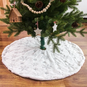 White faux fur Christmas tree skirt with silver embroidered snowflakes for holiday decor