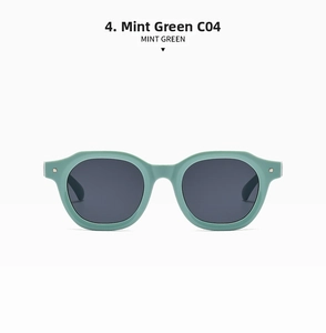Front view of mint green wide-frame sunglasses with high-quality dark grey lenses