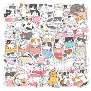 Detailed close-up of colorful waterproof cartoon cat stickers for planners and stationery