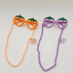 Children strawberry shaped eyeglass frames in orange and purple with plastic chains