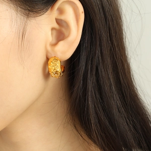 Vintage 18K gold plated C-shaped hoop earrings with star moon rhinestones on model