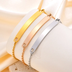 Polished stainless steel ID bar bracelets in gold, rose gold, and silver finishes