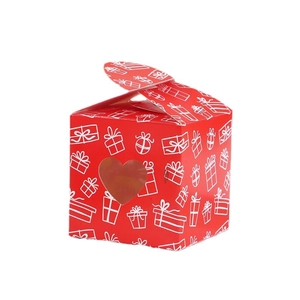 Red Valentine gift box with heart-shaped window and white festive pattern on white background