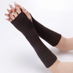 Detailed close-up of dark brown ribbed knit long fingerless gloves with thumb hole