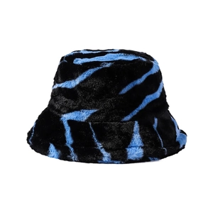 Plush zebra print bucket hat in electric blue and black for winter outdoor fashion