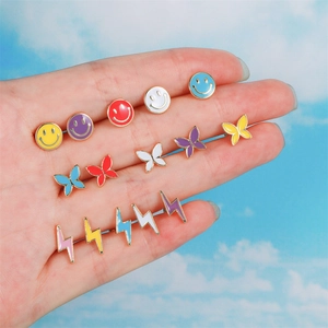 Colorful enamel stud earrings set with smiley face butterfly and lightning bolt shapes