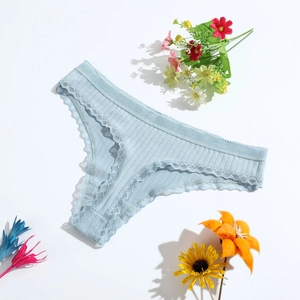 Light blue low-rise thong for women with ribbed cotton fabric and lace trim detail