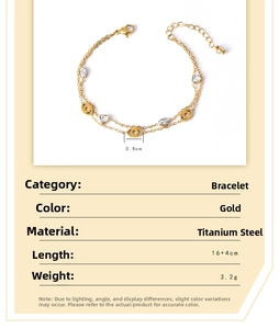 Detail of gold titanium steel double-layer bracelet with evil eye and white zircon charms