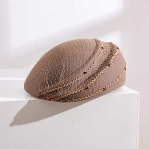 Elegant wool felt beret for women in dark camel with mesh net and wave sequins details