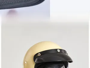 Detail of fleece neck warmer attached to a vintage motorcycle helmet for winter wind protection