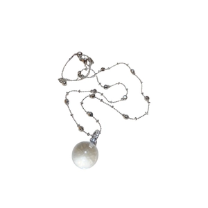 Sparkling crystal sphere pendant necklace with silver chain and tiny diamond accents