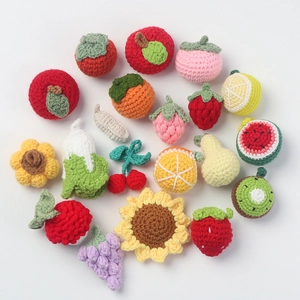 Handmade crochet fruit and flower keychains collection on a clean white background