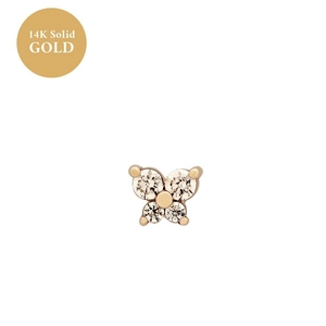 Macro detail of butterfly stud earring in 14K solid gold with four sparkling gemstones