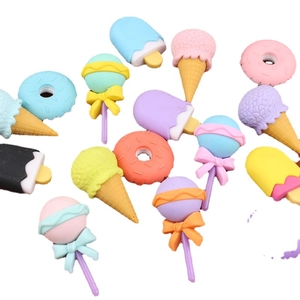 Creative dessert-shaped erasers including donuts and ice cream on white background
