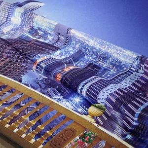 Detail of bohemian cityscape tapestry showing dense skyscrapers and golden terrace fences