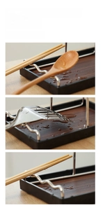 Close-up of three-tier kitchen utensil rest showing spatula, spoon and chopstick slots
