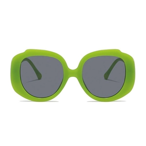 Fashionable neon green oversized irregular sunglasses with dark grey lenses for women